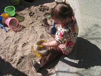 Toddler with sand